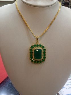 20. Art Emerald locket with chain